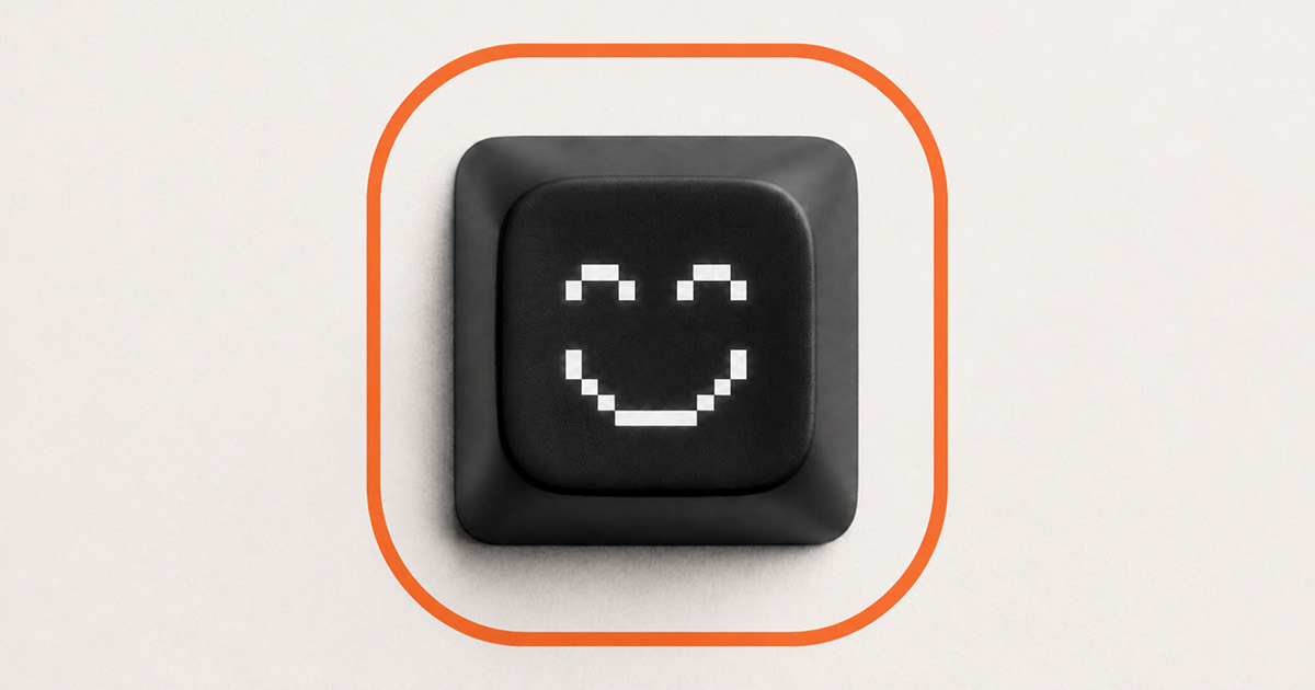 AI engineering copilot: a black keyboard key with a smiling pixel face inside an orange rounded outline